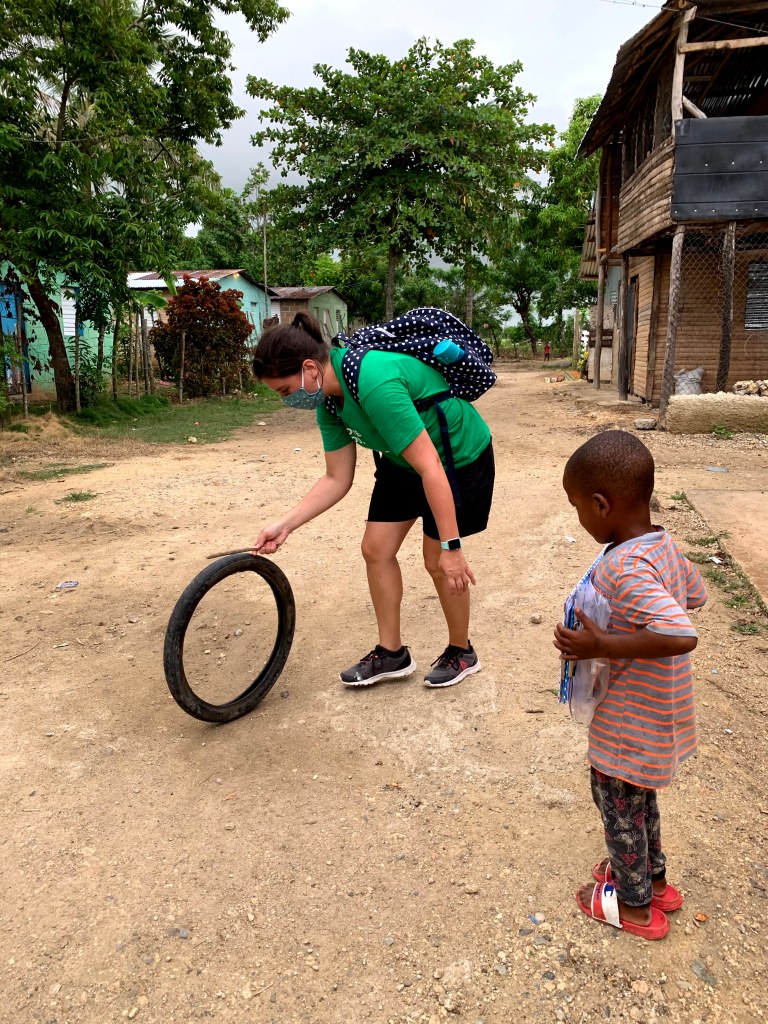 Savannah learning how to work the tire/stick toy